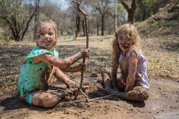 Kids playing in the mud