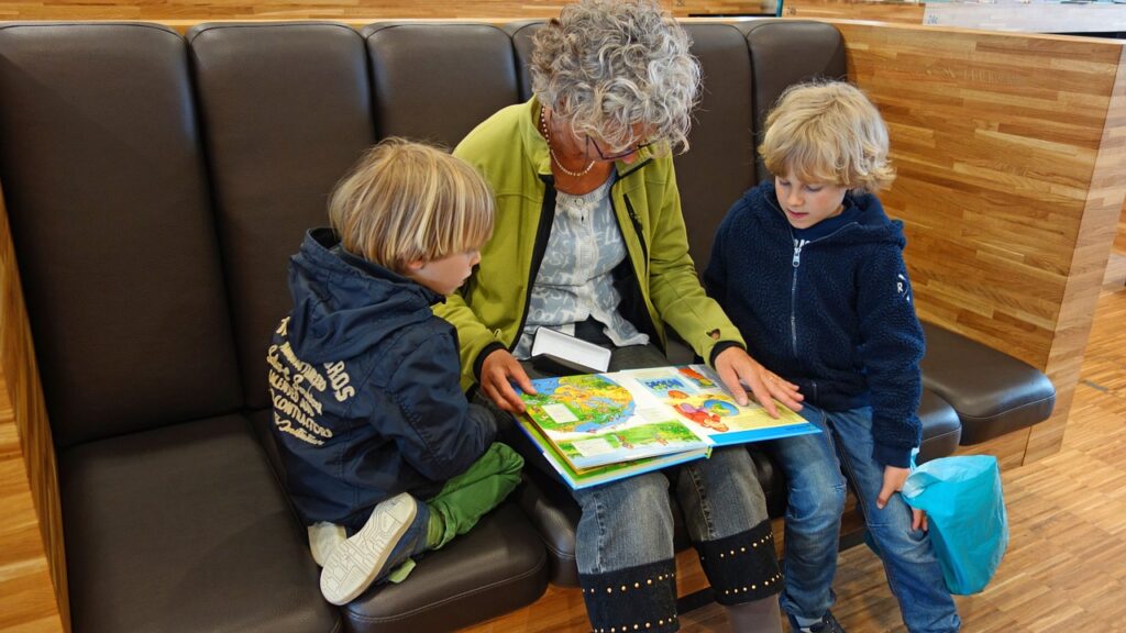 Grandma reads stories to her grandchildren