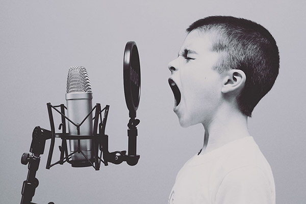 The boy sings, photo credit Jason Rosewell