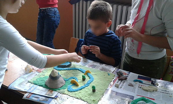 Group work with clay, theme "My village"