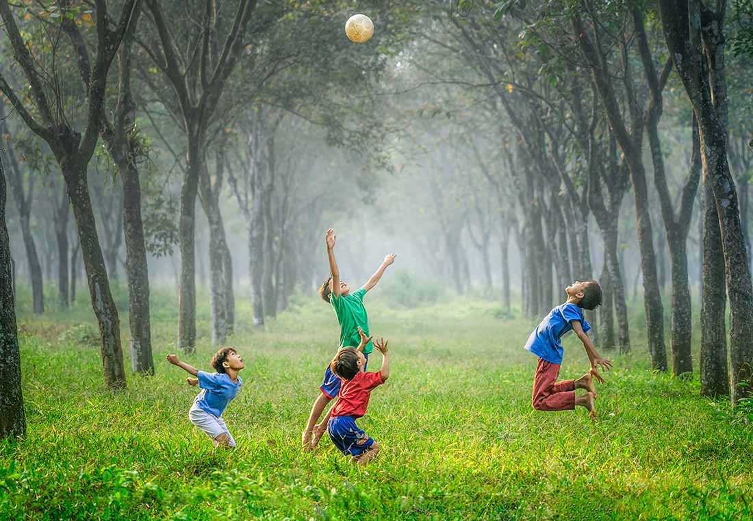 The kids are playing with the ball,photo credit Robert Collins, unsplash